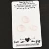 Dior Rose Cut Morganite Cabochon Parcel shown on business card