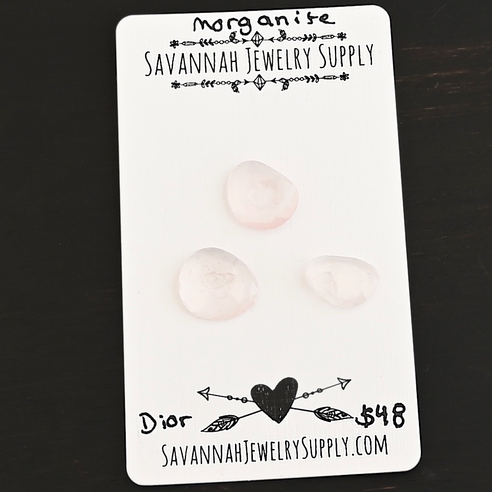 Dior Rose Cut Morganite Cabochon Parcel shown on business card