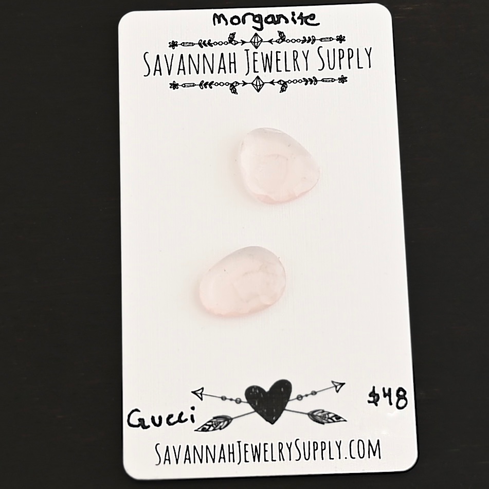 Gucci Rose Cut Morganite Cabochon Parcel shown on business card