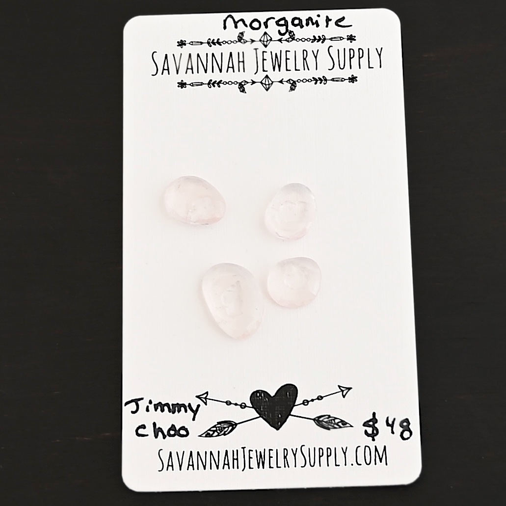 Jimmy Choo Rose Cut Morganite Cabochon Parcel shown on business card