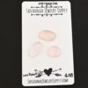 Louboutin Rose Cut Morganite Cabochon Parcel shown on business card