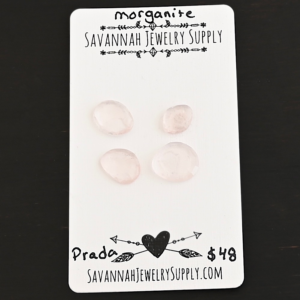 Prada Rose Cut Morganite Cabochon Parcel shown on business card