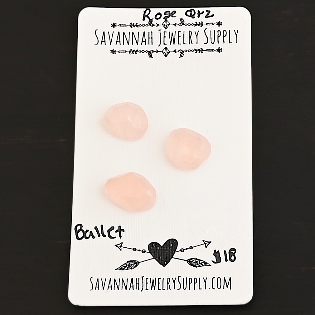 Ballet Rose Cut Rose Quartz Cabochon Parcel shown on business card