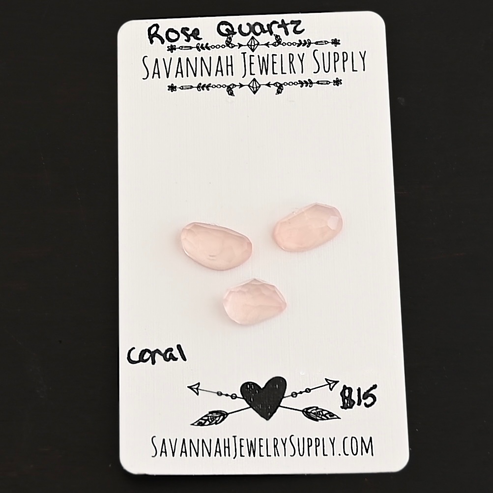 Coral Rose Cut Rose Quartz Cabochon Parcel shown on business card