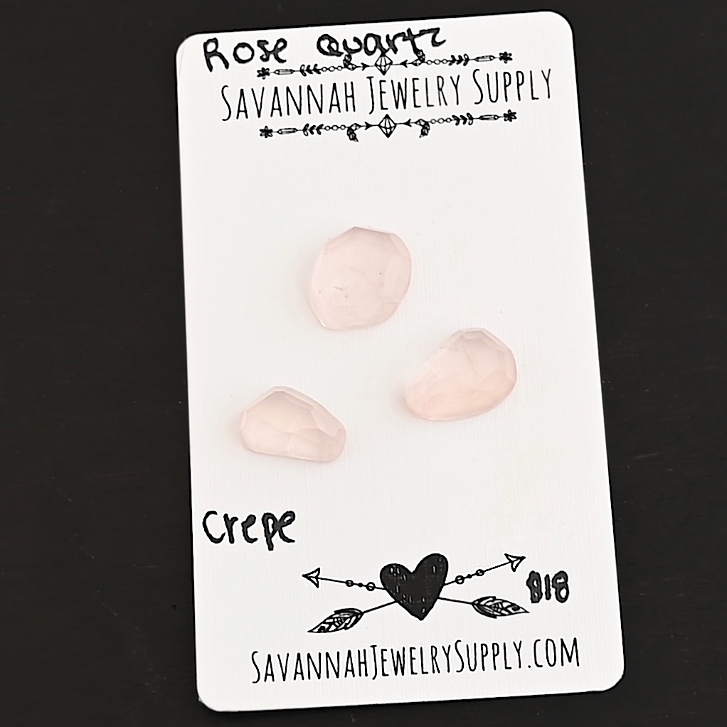 Crepe Rose Cut Rose Quartz Cabochon Parcel shown on business card