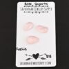 Fuchsia Rose Cut Rose Quartz Cabochon Parcel shown on business card