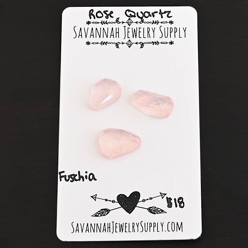 Fuchsia Rose Cut Rose Quartz Cabochon Parcel shown on business card
