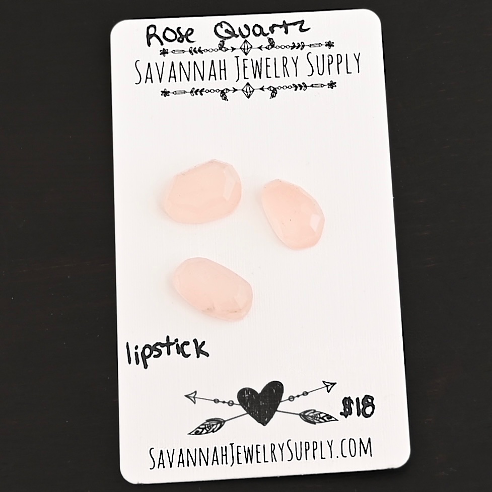 Lipstick Rose Cut Rose Quartz Cabochon Parcel shown on business card