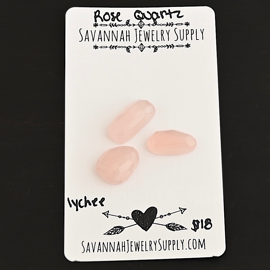 Lychee Rose Cut Rose Quartz Cabochon Parcel shown on business card