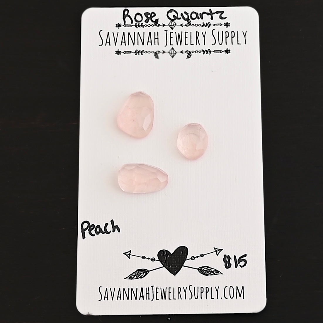 Peach Rose Cut Rose Quartz Cabochon Parcel shown on business card