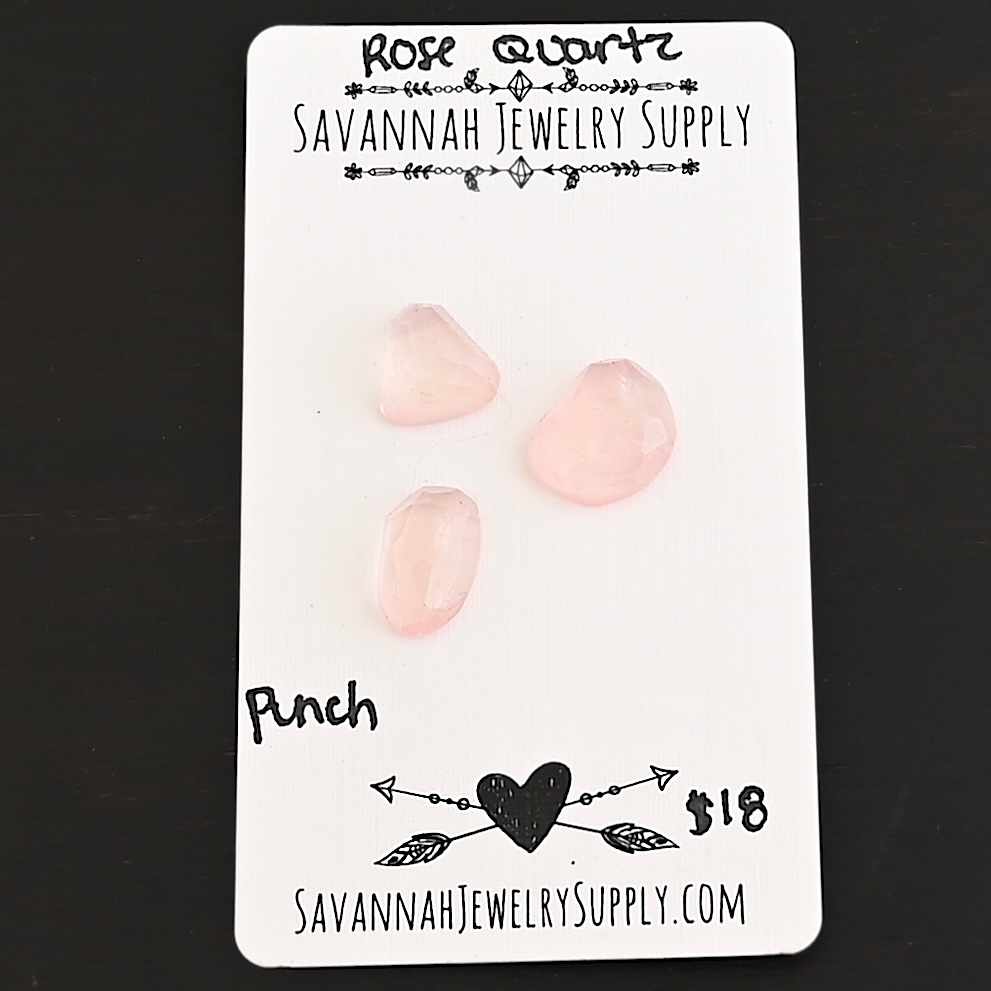 Punch Rose Cut Rose Quartz Cabochon Parcel shown on business card