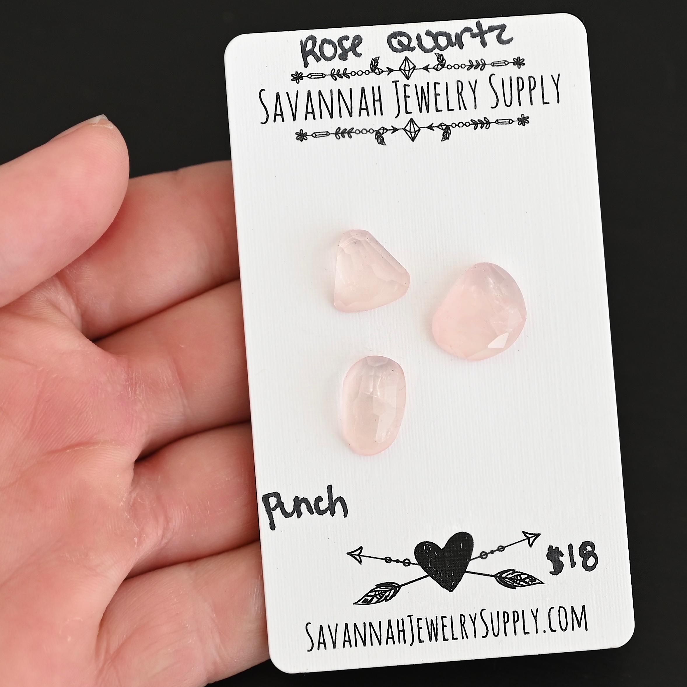 Punch Rose Cut Rose Quartz Cabochon Parcel shown in hand