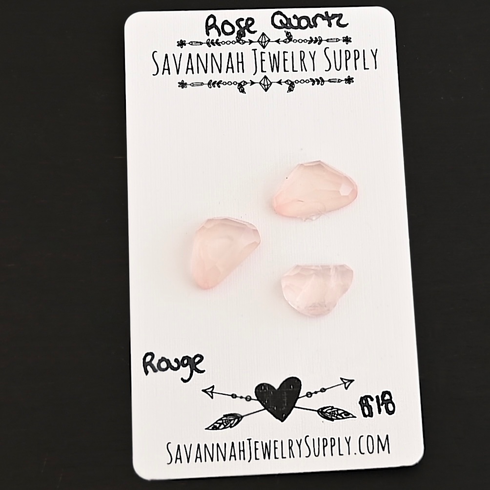 Rouge Rose Cut Rose Quartz Cabochon Parcel shown on business card
