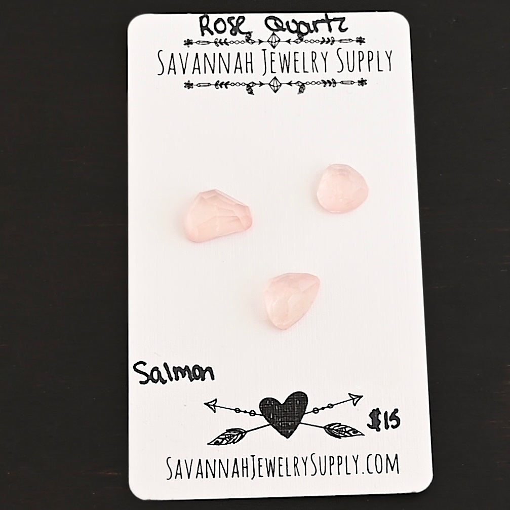 Salmon Rose Cut Rose Quartz Cabochon Parcel shown on business card