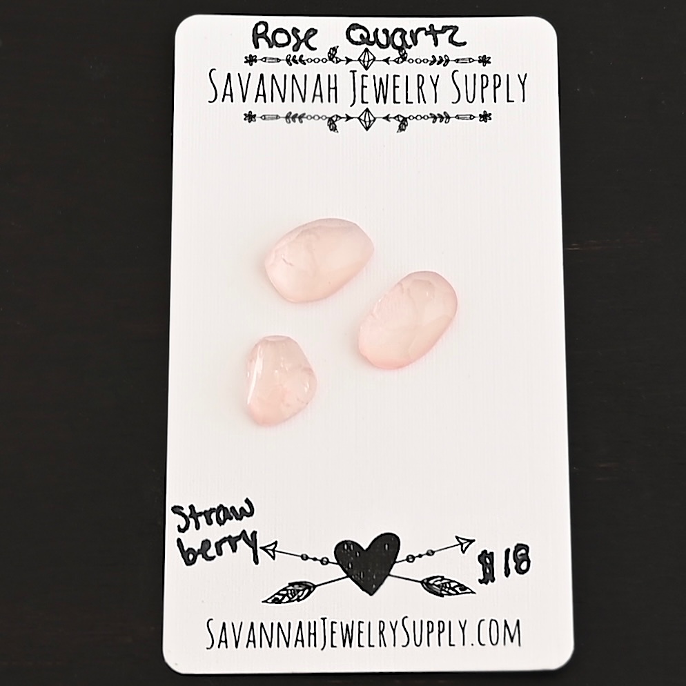 Strawberry Rose Cut Rose Quartz Cabochon Parcel shown on business card