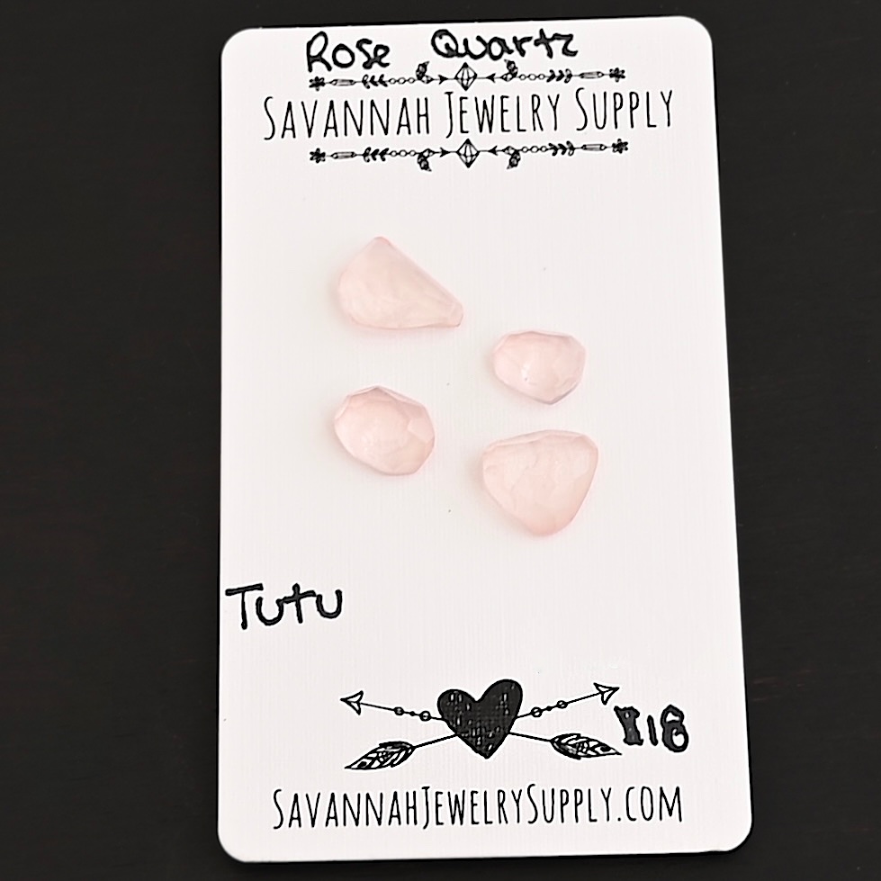 Tutu Rose Cut Rose Quartz Cabochon Parcel shown on business card