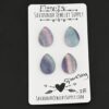 Sparkling Fluorite Cabochon Parcel shown on business card