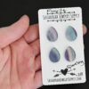 Sparkling Fluorite Cabochon Parcel shown in hand
