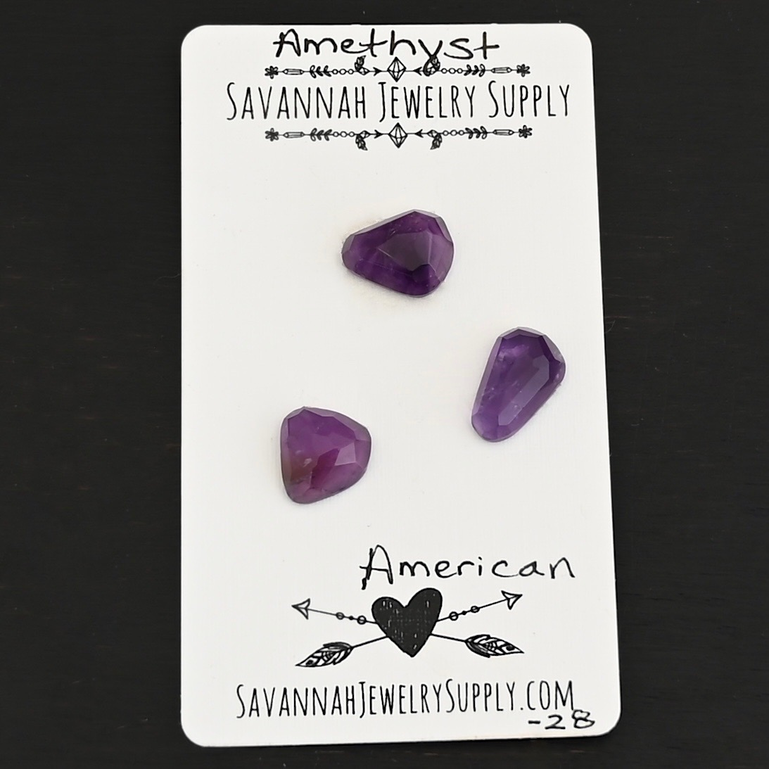 American Rose Cut Amethyst Cabochon Parcel shown on business card