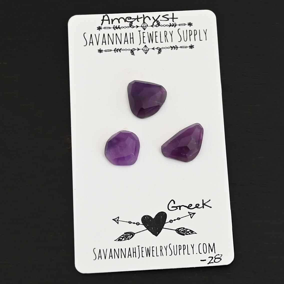 Greek Rose Cut Amethyst Cabochon Parcel shown on business card