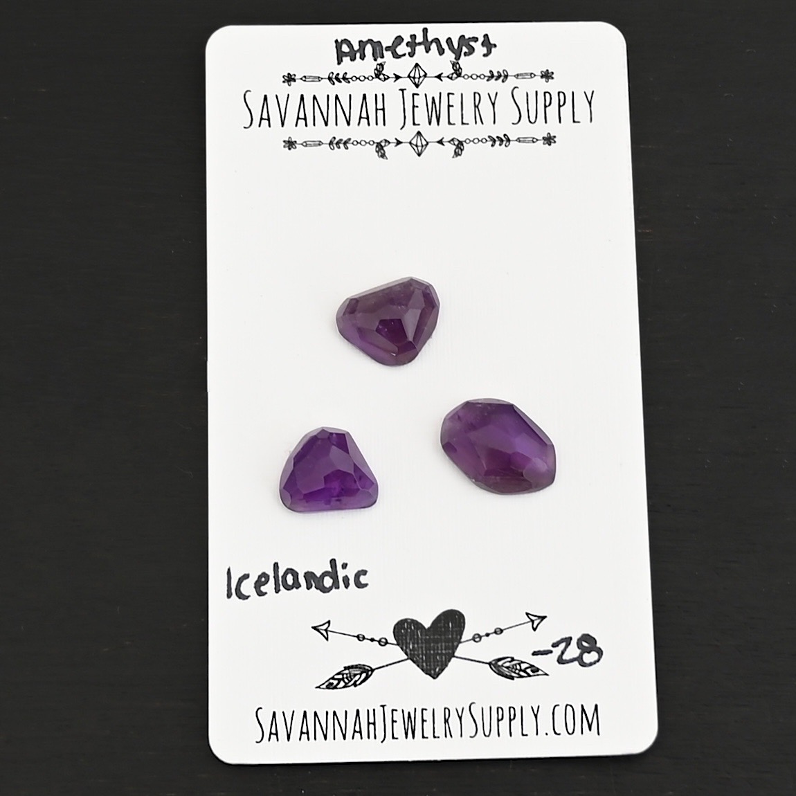 Icelandic Rose Cut Amethyst Cabochon Parcel shown on business card