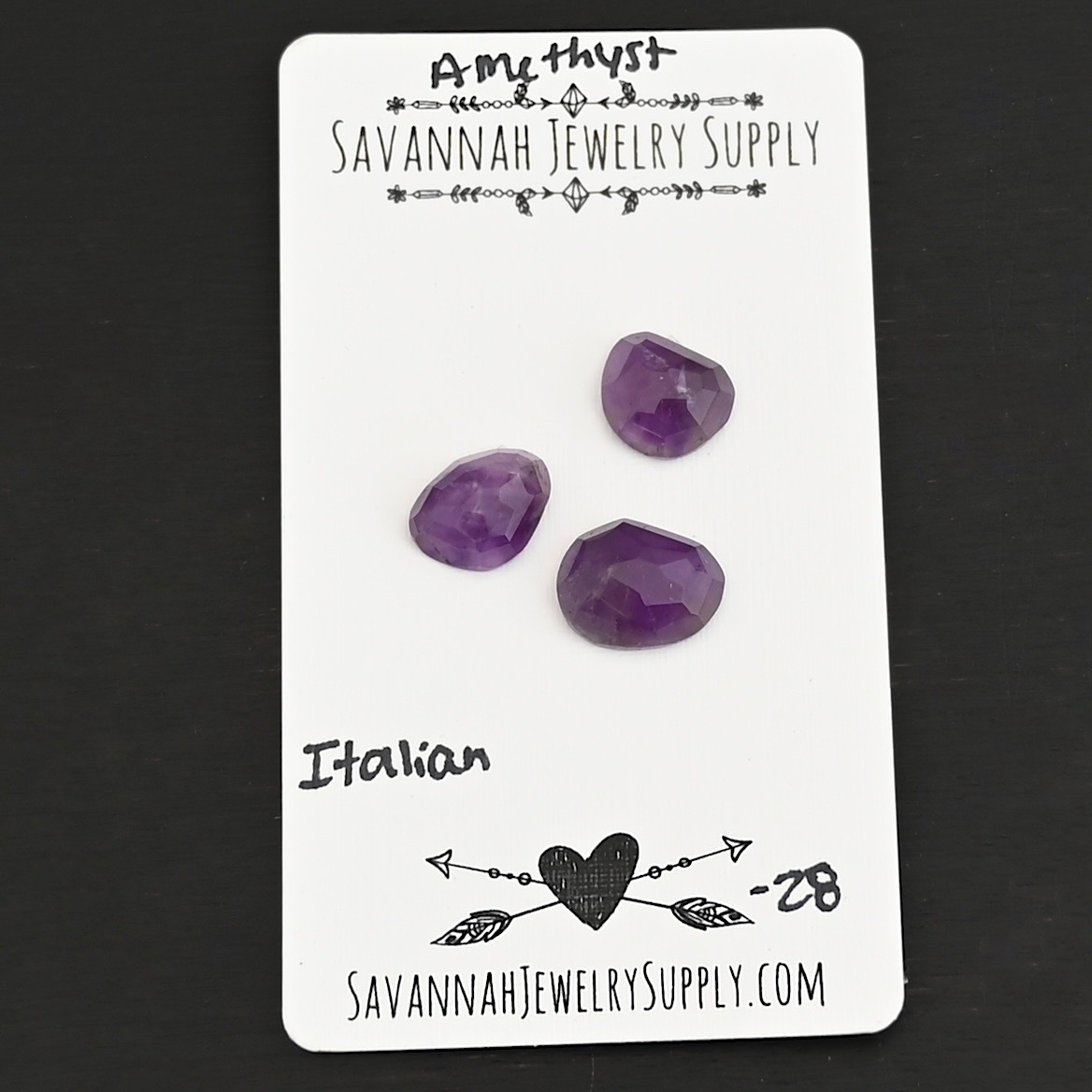 Italian Rose Cut Amethyst Cabochon Parcel shown on business card