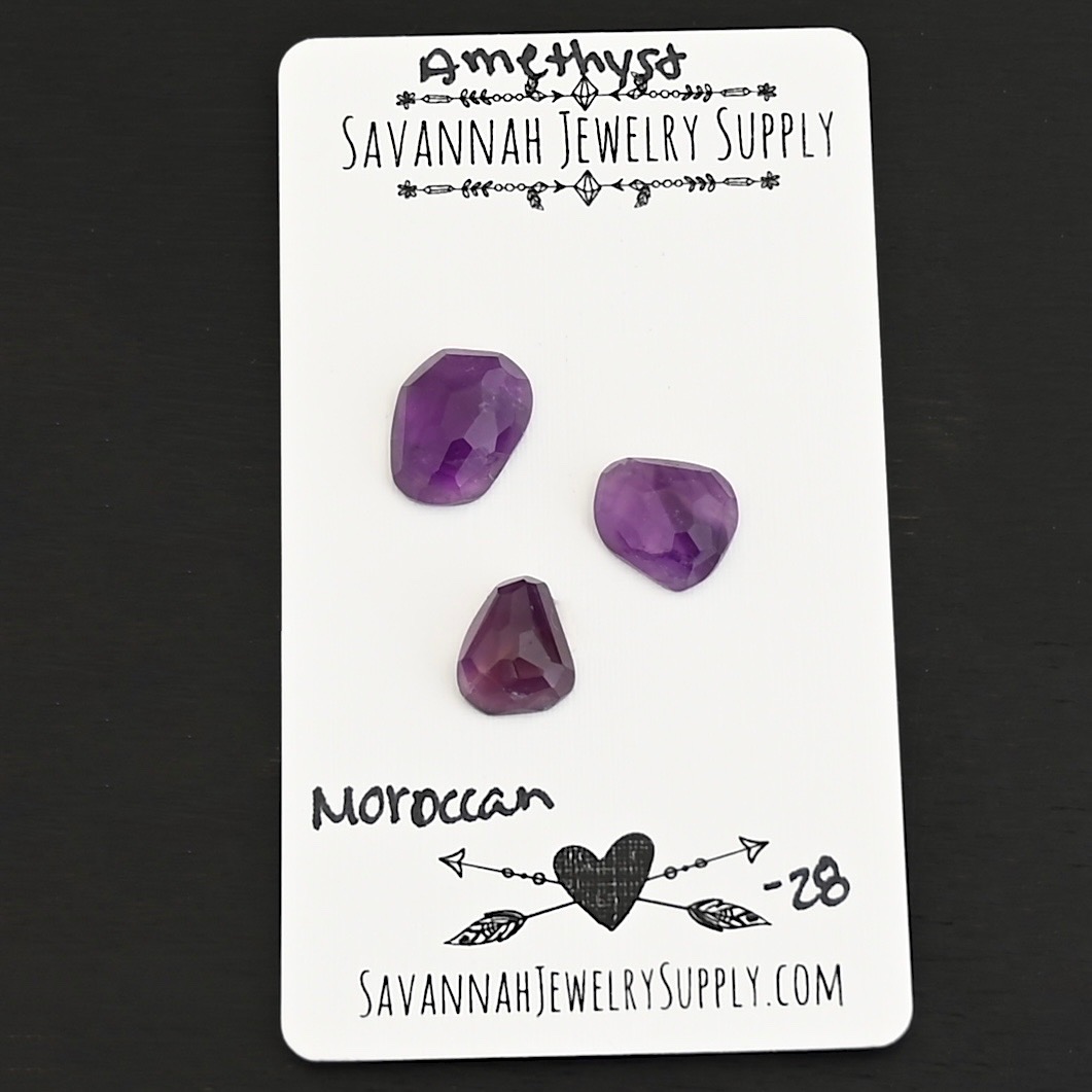 Moroccan Rose Cut Amethyst Cabochon Parcel shown on business card
