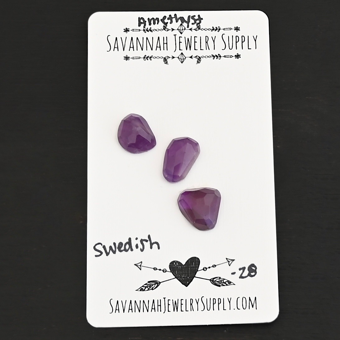 Swedish Rose Cut Amethyst Cabochon Parcel shown on business card