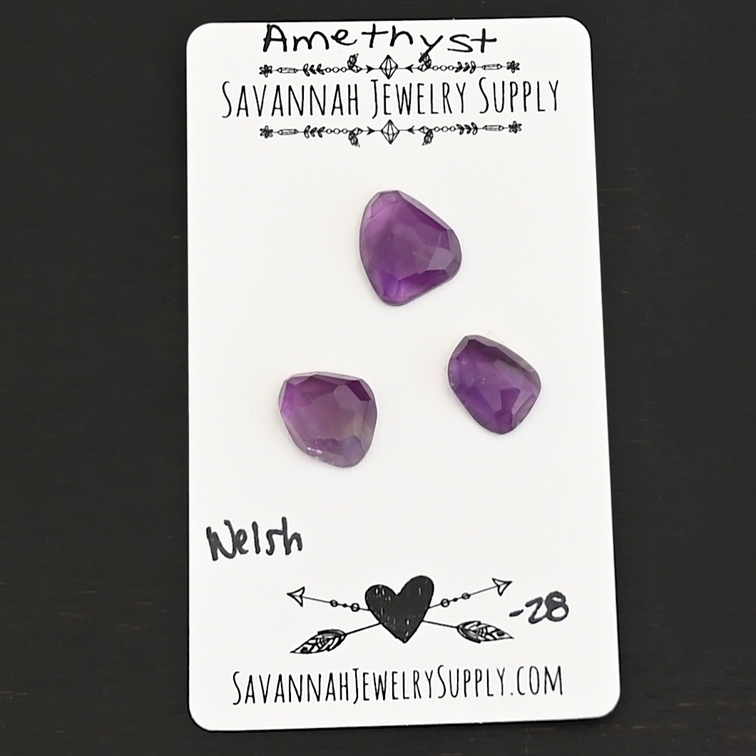 Welsh Rose Cut Amethyst Cabochon Parcel shown on business card