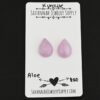 Aloe Kunzite Cabochon Parcel shown on business card