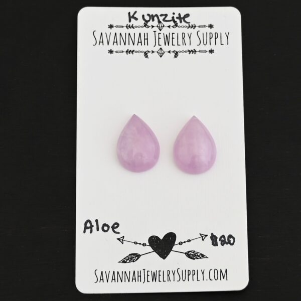 Aloe Kunzite Cabochon Parcel shown on business card