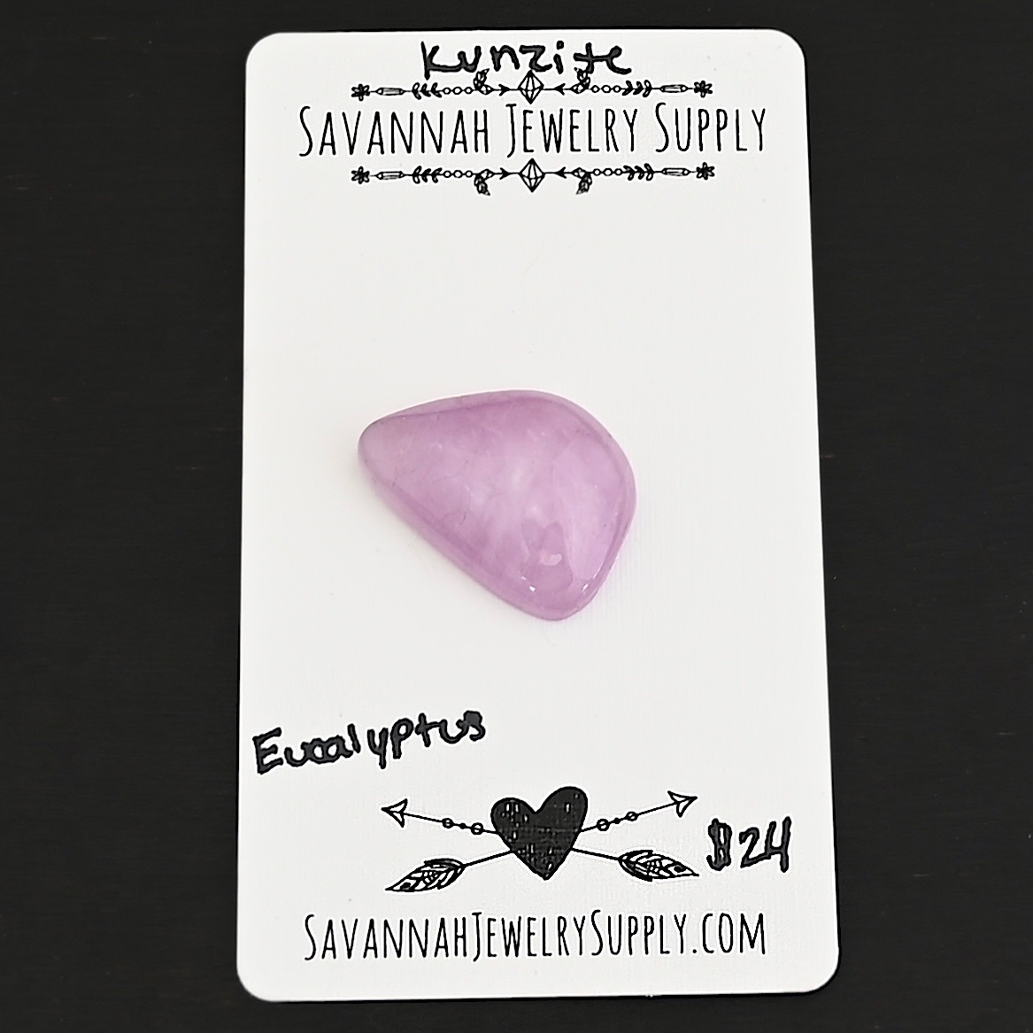 Eucalyptus Kunzite Cabochon Parcel shown on business card