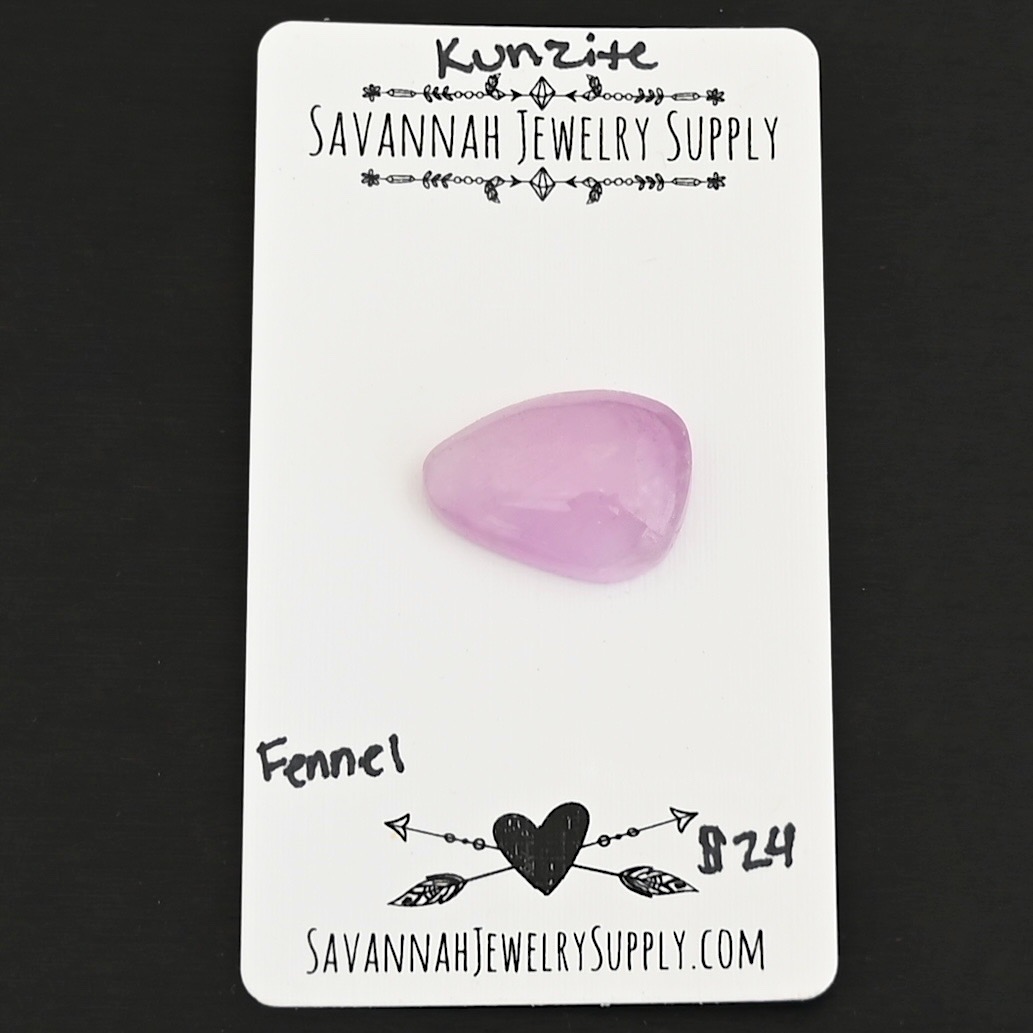 Fennel Kunzite Cabochon Parcel shown on business card