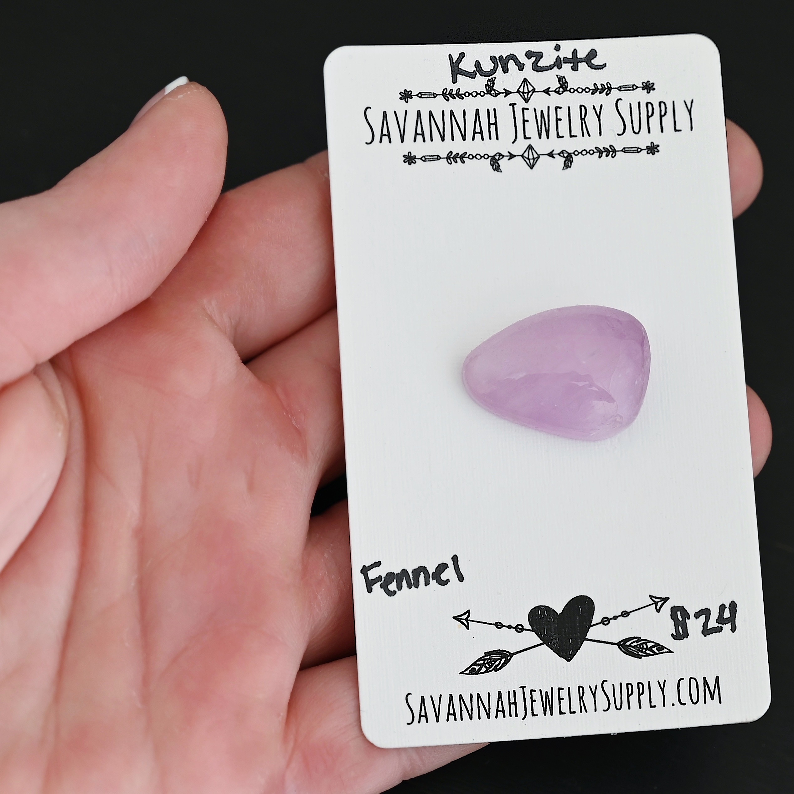 Fennel Kunzite Cabochon Parcel shown in hand