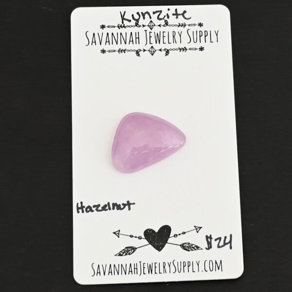 Hazelnut Kunzite Cabochon Parcel shown on business card