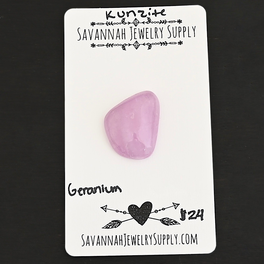 Geranium Kunzite Cabochon Parcel shown on business card