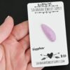 Heather Kunzite Cabochon Parcel shown in hand