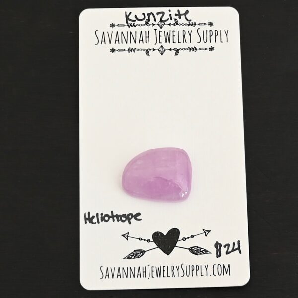 Heliotrope Kunzite Cabochon Parcel shown on business card
