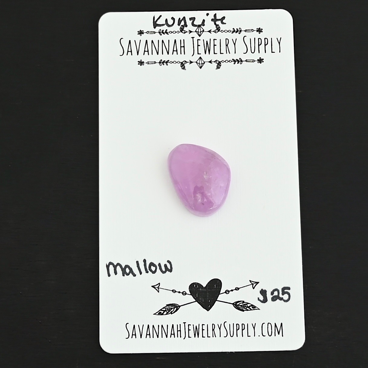Mallow Kunzite Cabochon Parcel shown on business card