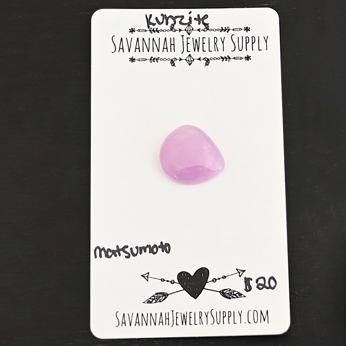 Matsumoto Kunzite Cabochon Parcel shown on business card