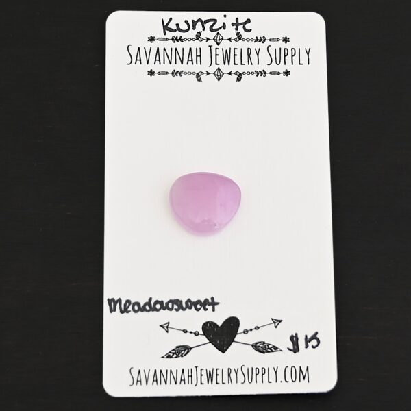 Meadowsweet Kunzite Cabochon Parcel shown on business card