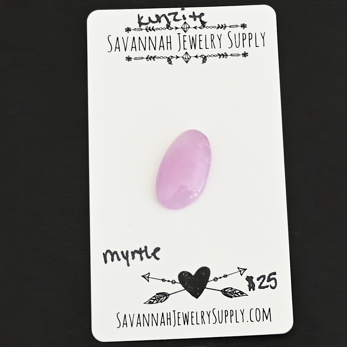 Myrtle Kunzite Cabochon Parcel shown on business card