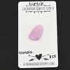 Nemesia Kunzite Cabochon Parcel shown on business card