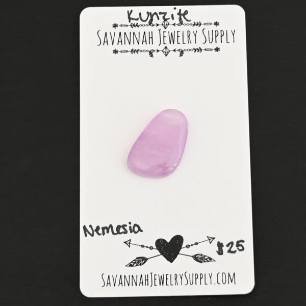 Nemesia Kunzite Cabochon Parcel shown on business card