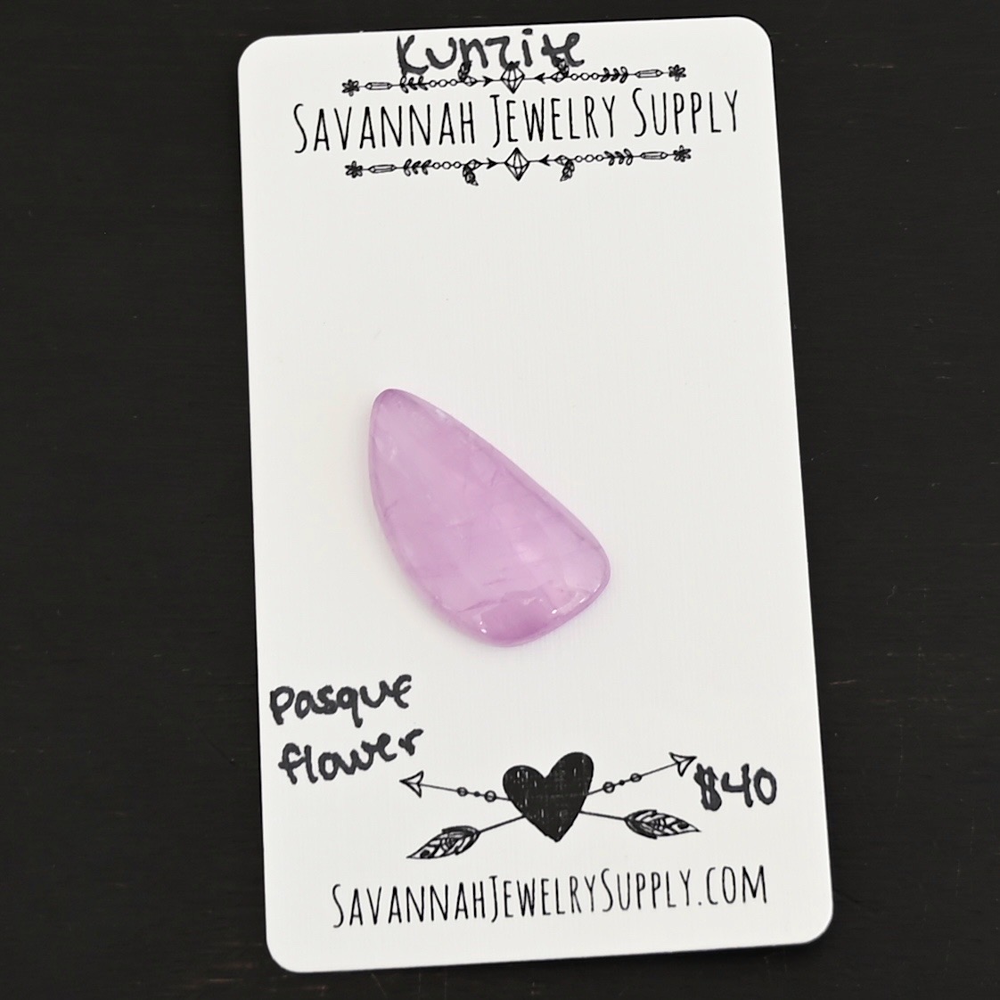 Pasque Flower Kunzite Cabochon Parcel shown on business card