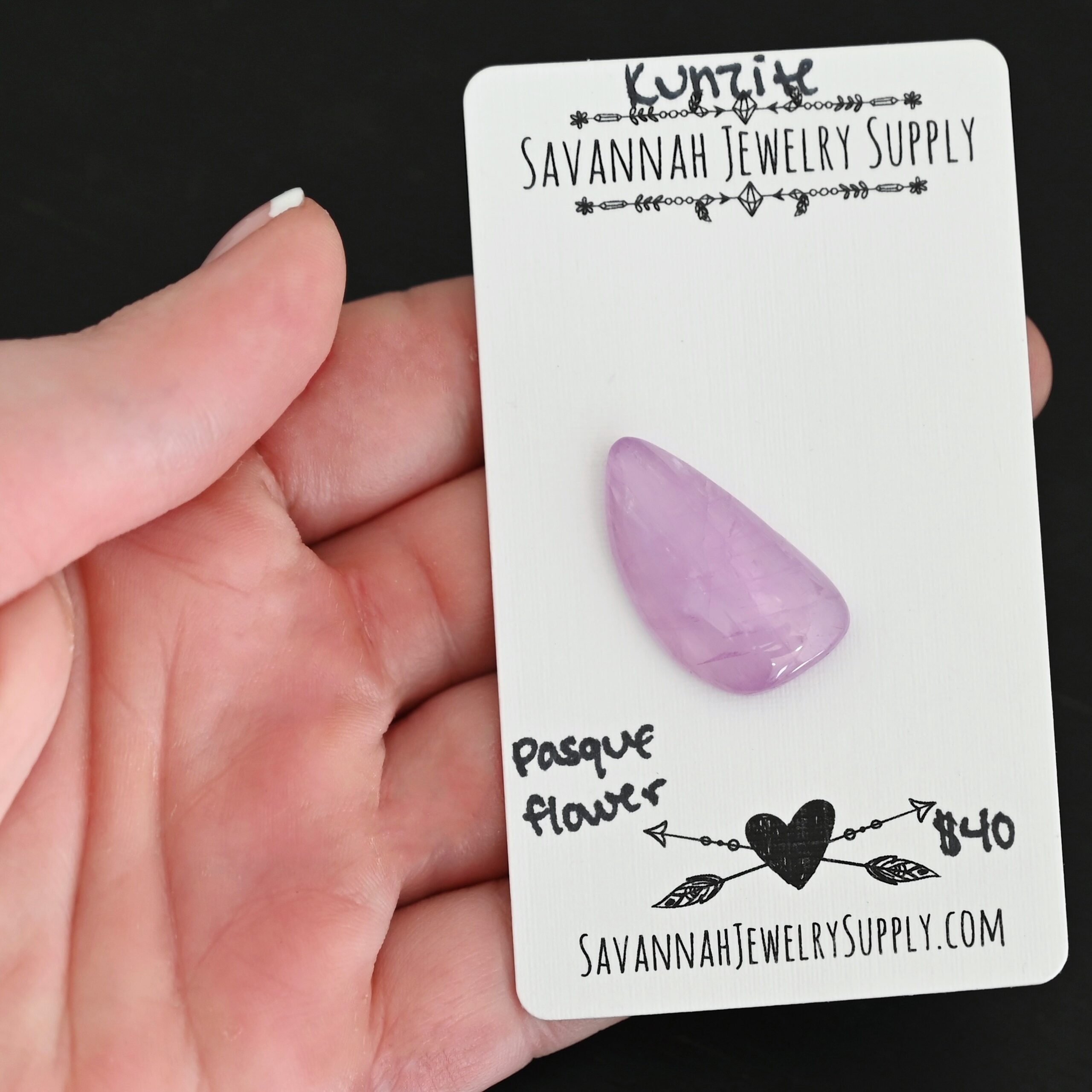 Pasque Flower Kunzite Cabochon Parcel shown in hand