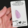 Periwinkle Kunzite Cabochon Parcel shown in hand