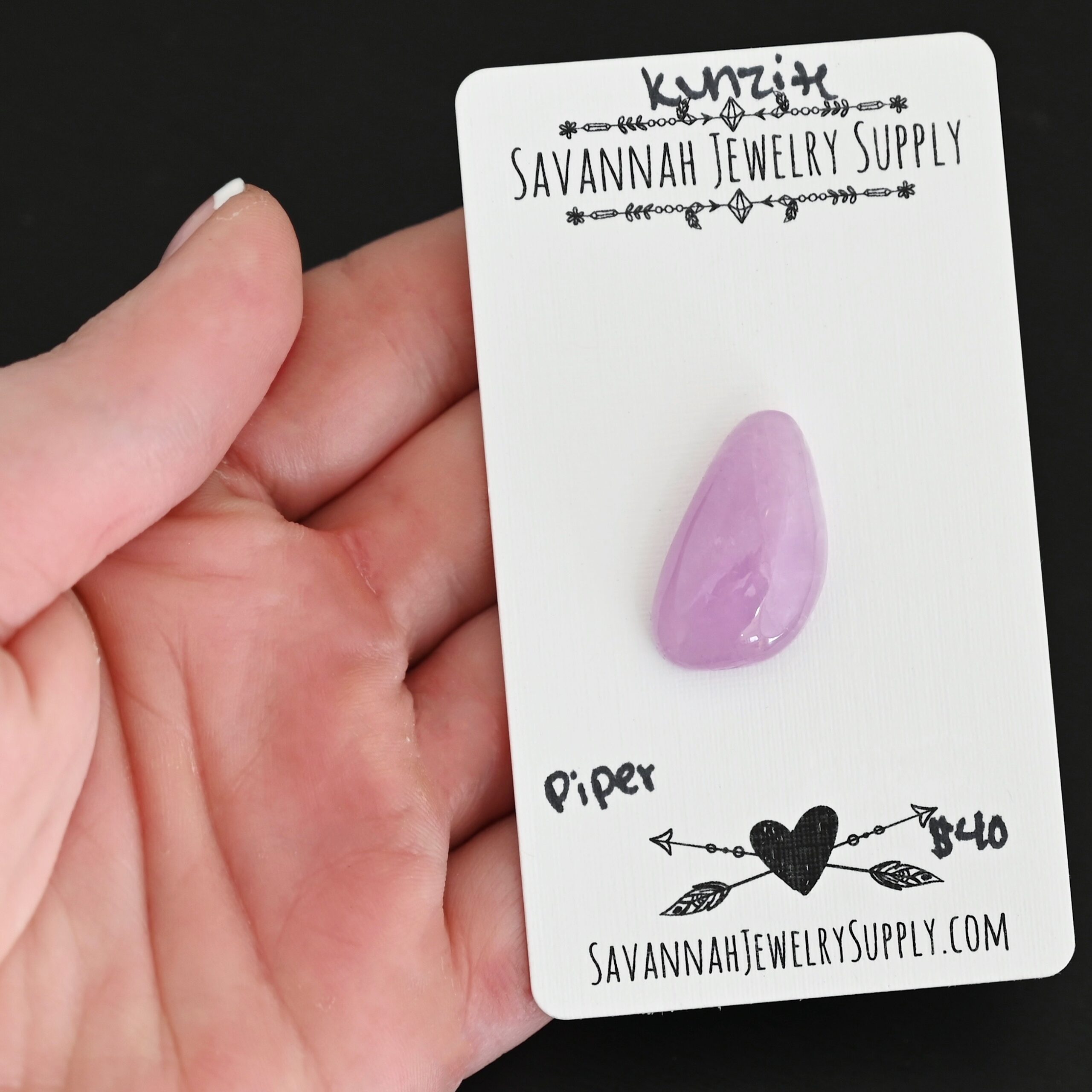 Piper Kunzite Cabochon Parcel shown in hand