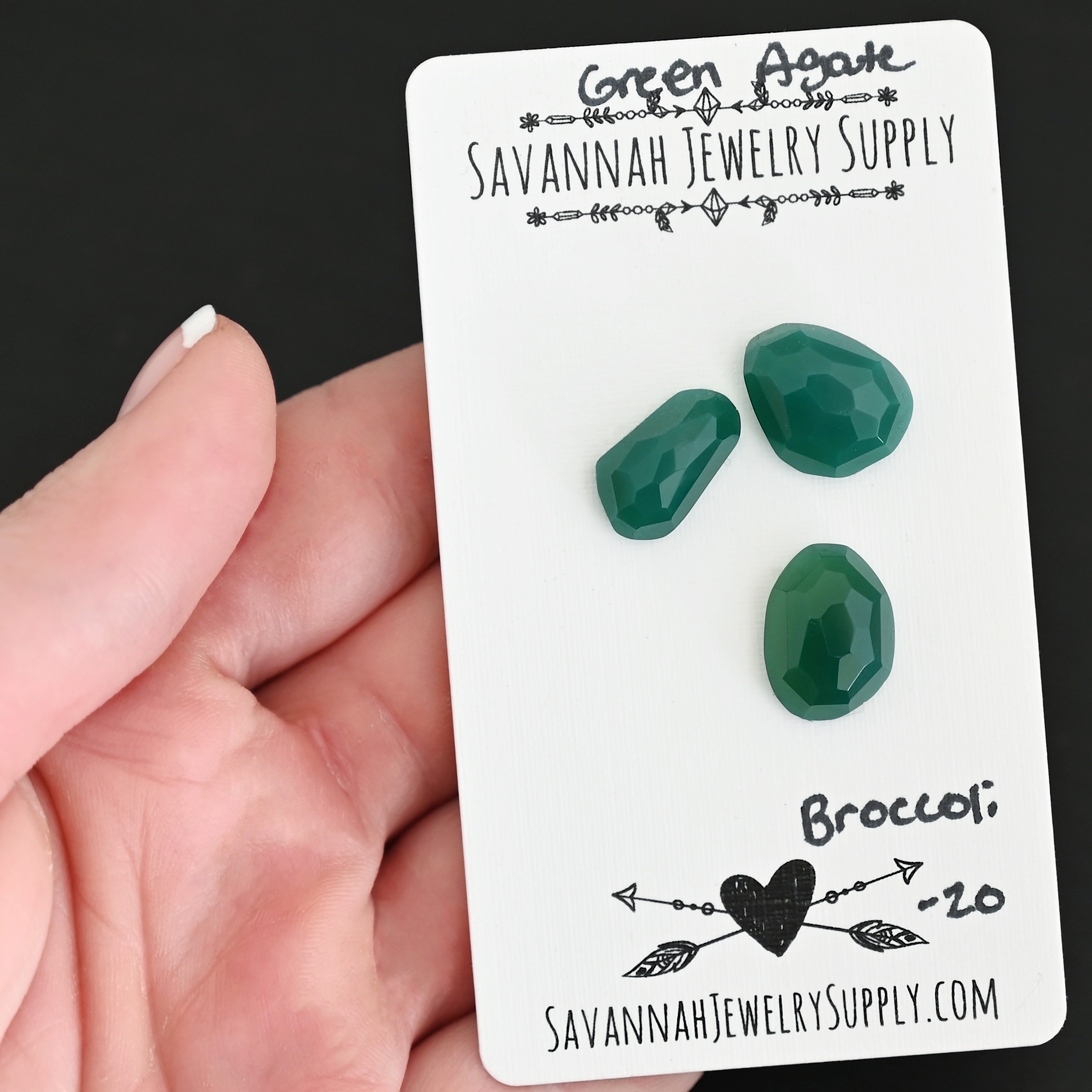 Broccoli Rose Cut Green Agate Cabochon Parcel shown in hand