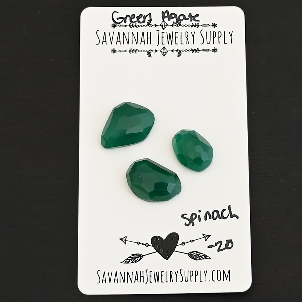 Spinach Rose Cut Green Agate Cabochon Parcel shown on business card